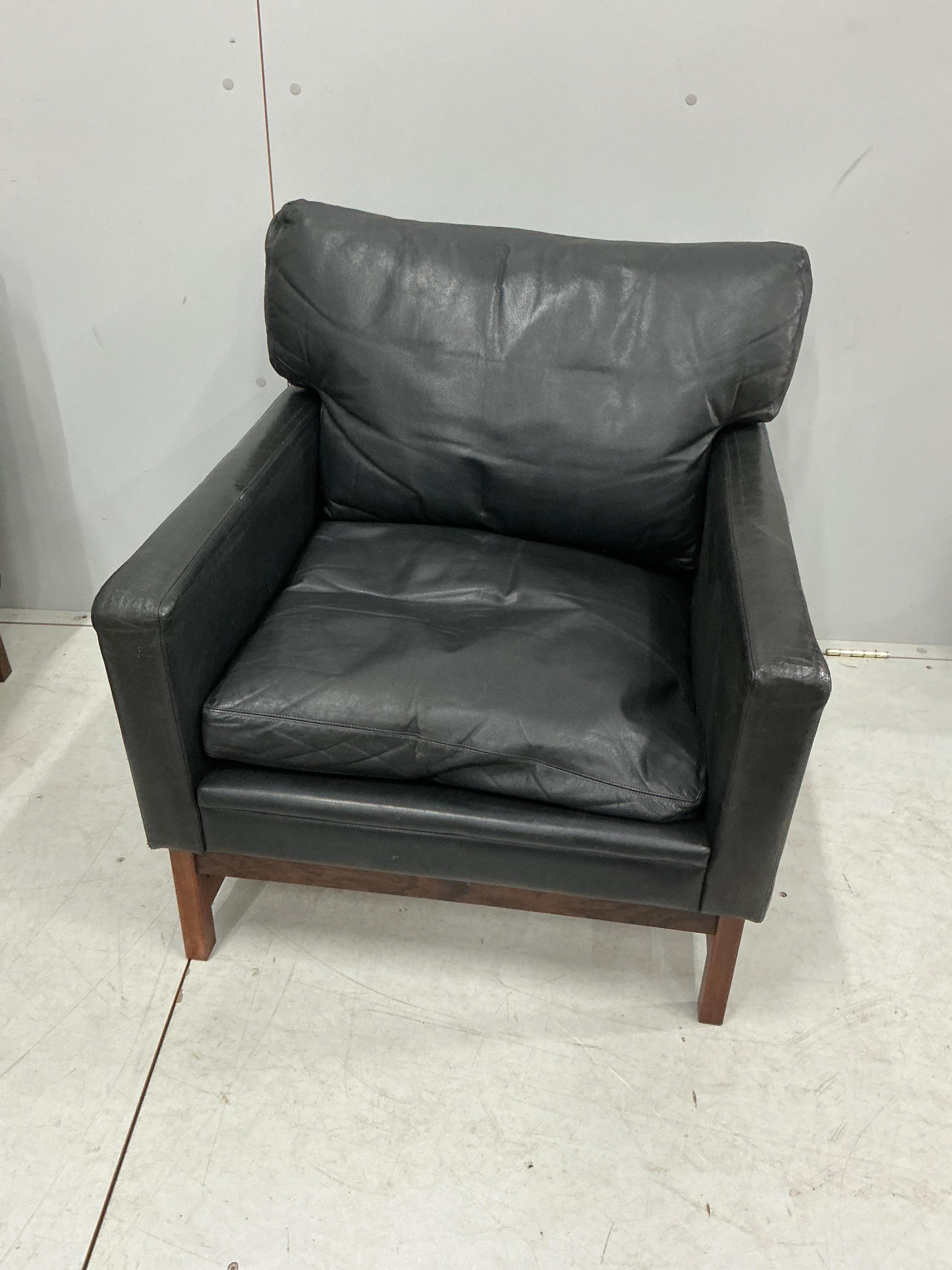 A Swedish two seat sofa and armchair